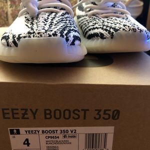 A new pair of Yeezys in zebra color